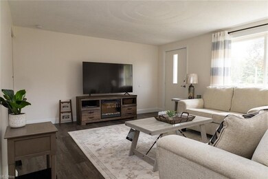 View of hardwood floored living room