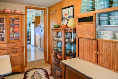 Between the kitchen and the sun room, there's a la