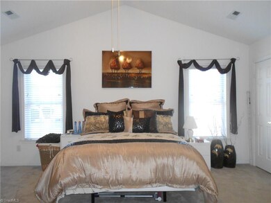 Large Master Bedroom with vaulted ceiling.