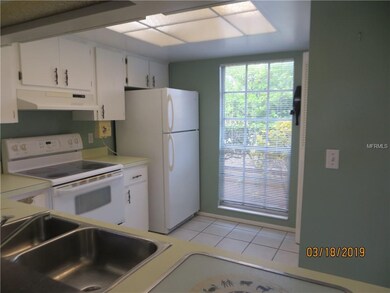 Nice size kitchen with lots of cabinets.