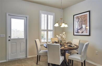 Dining area with access to covered patio - *Photos