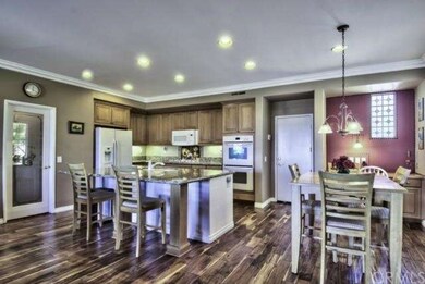 Gourmet kitchen with breakfast nook and desk