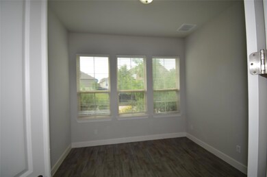 Empty room featuring plenty of natural light, dar