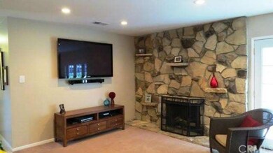 Recess lighting and rock fire place.