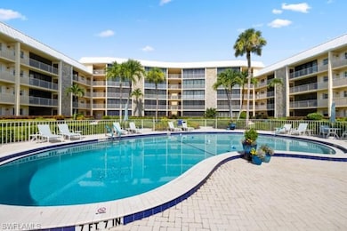 Community pool featuring a patio area