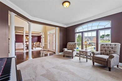 Formal living room w/beautiful oversized windows o