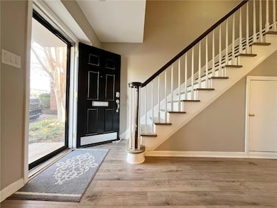 Entrance foyer featuring plenty of natural light a