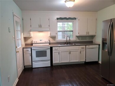 Kitchen-Tile back splash, prefinished wood floors,