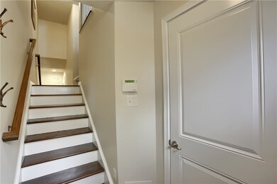 Entry of home looking from the front door up the s
