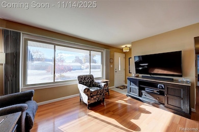 Living area with light wood-style flooring