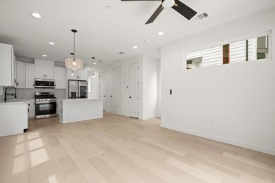 Kitchen featuring appliances with stainless steel