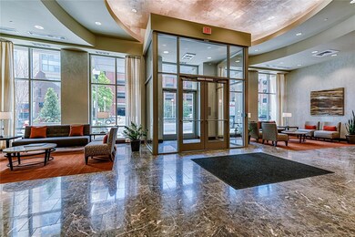Large lobby greets guest with 24/7 doorman attenda
