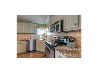 Stainless appliances and painted cabinets