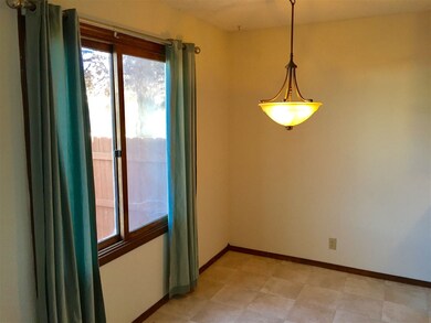 Dining area with brand new laminate flooring and c