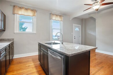 Kitchen to rear of house and back door to deck.