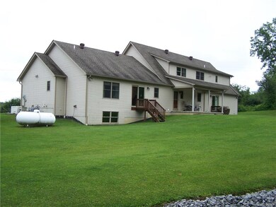 View of east side of house and rear