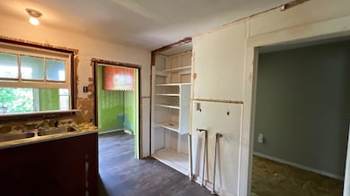 Bathroom featuring hardwood / wood-style floors an