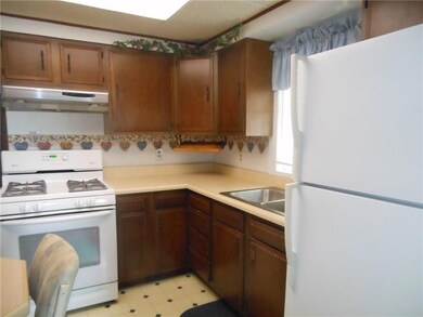 Eat-in kitchen with newer appliances & plenty of c
