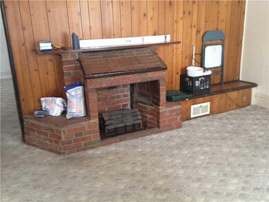Living Room. living room has a decorative fireplac
