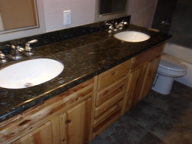 MASTER VANITY. HICKORY CABINETS
