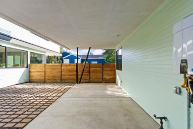 View of patio with fence