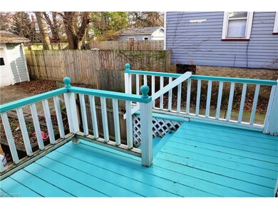 This back deck extends off the screened-in porch and also has a door off the kitchen as well for easy access to the grill.