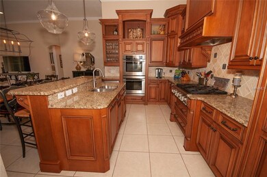 Deluxe gas range with vented hood, built in refrig