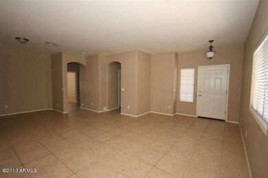 Entry into formal living & dining
