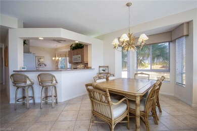 Dining room with light tile patterned flooring and