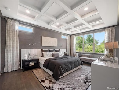 Luxurious primary bedroom suite