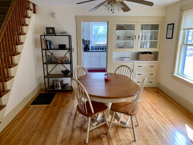 built-in hutch and open to the living room