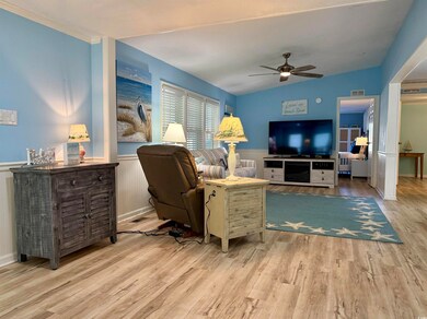 Living room featuring light wood-type flooring, ce
