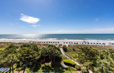 Bird's eye view featuring a beach view and a water
