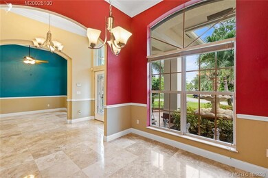 FROMAL DININGROOM LOOKS AT WATER FOUNTAIN AND LUSH