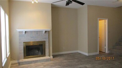 THE LIVING AREA WITH REFACED FIREPLACE, NEW TILE F
