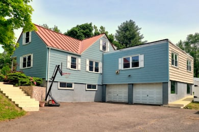 Front/side view (In-law apartment on right above garage)