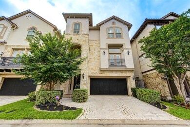 This elegant, three-story townhouse features a sto