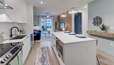 Kitchen featuring appliances with stainless steel