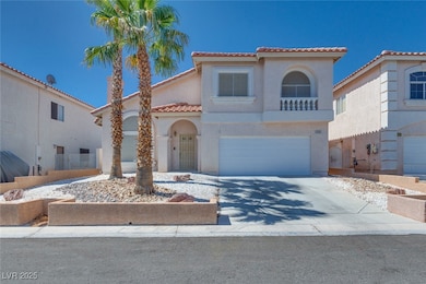Mediterranean / spanish house featuring a tile roo