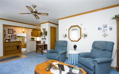 Living room, looking into family room, kitchen and