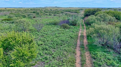 Aerial overview of property's location with rural landscape