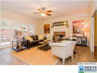 2nd view of the main level den with fireplace and 