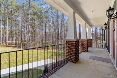 View of patio featuring a porch
