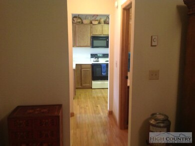MAIN BR 3: FROM MAIN LEVEL BEDROOM PAST BATH TO KI