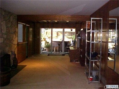 Living room facing patio