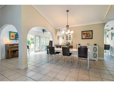 Dining Room. Open plan offers lush tropical settin
