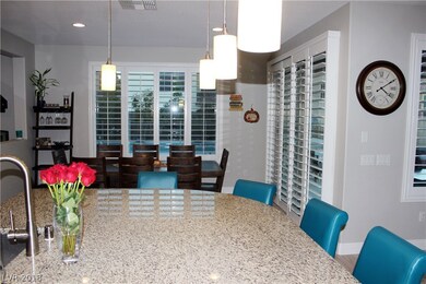 View from kitchen island/breakfast nook into the d