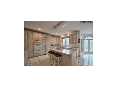 Spacious kitchen with tile flooring, large eat-in 