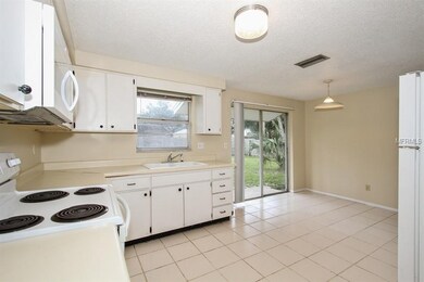 Large 12' x 8' Kitchen opens into 9' x 9' Dining R