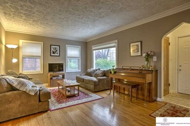 Recently Re-finished hard wood floors, lots of natural light and crown molding